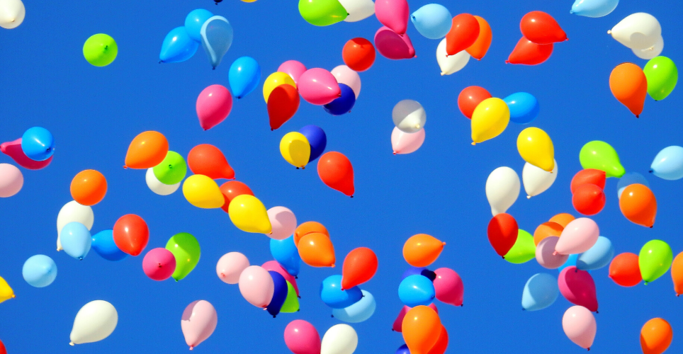 Colorful balloons floating in the sky