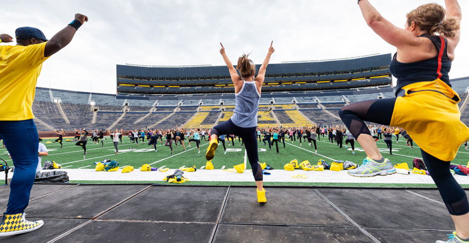 Zumba session on the field of Michigan Stadium.