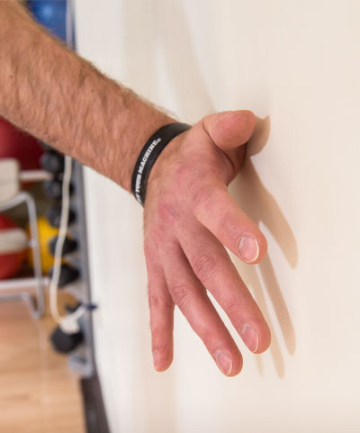 close up of hand on wall