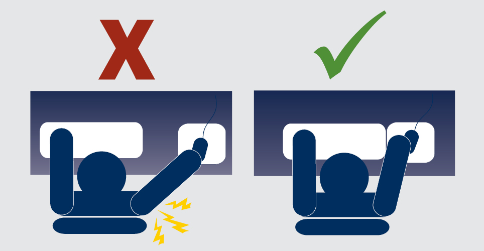 Illustration of human figures sitting at a desk. One is ergonomically correct with the mouse in the proper position and the other is not, with the mouse too far away from the body. 