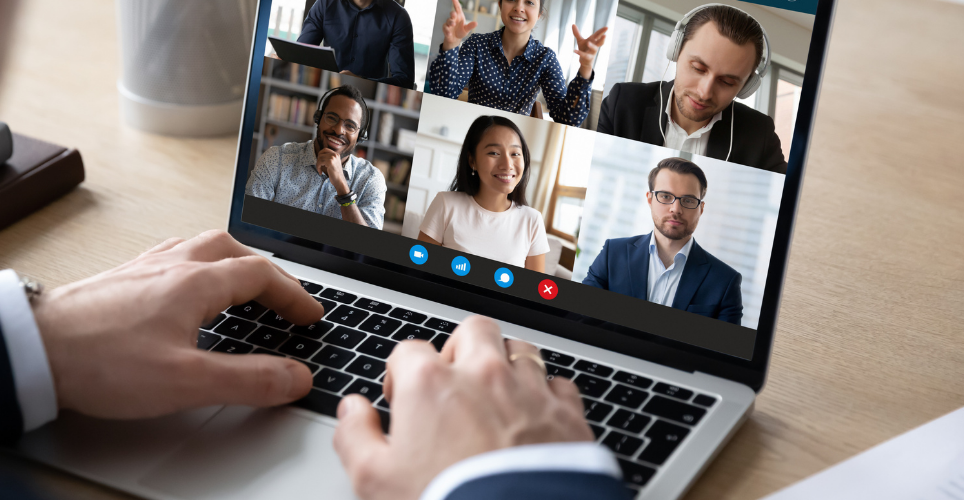 Person in an online meeting with six others on the screen. 