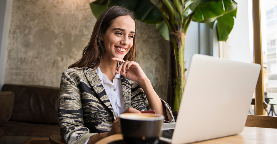 Woman sitting at her desk taking an online course