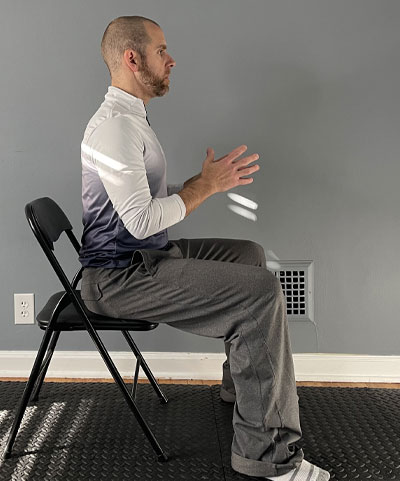 man sitting on chair