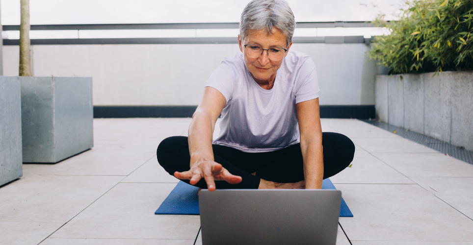 woman reviewing information on a computer