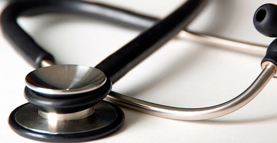 Closeup of a stethoscope on a white background