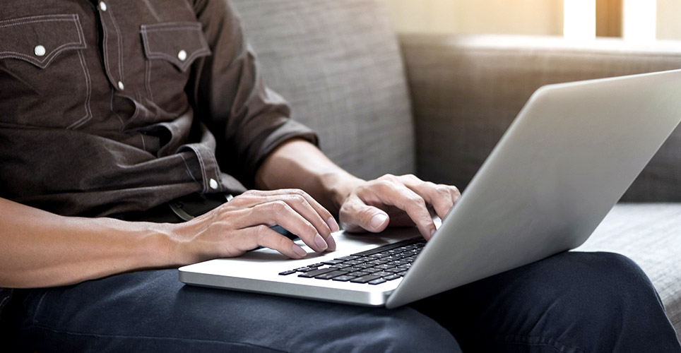 person working from home on laptop